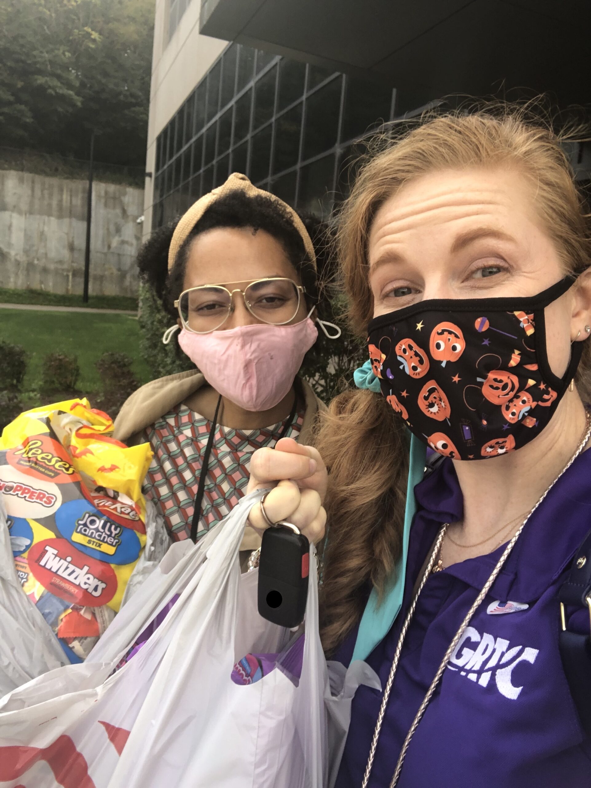 Ashley and Carrie donate Halloween candy