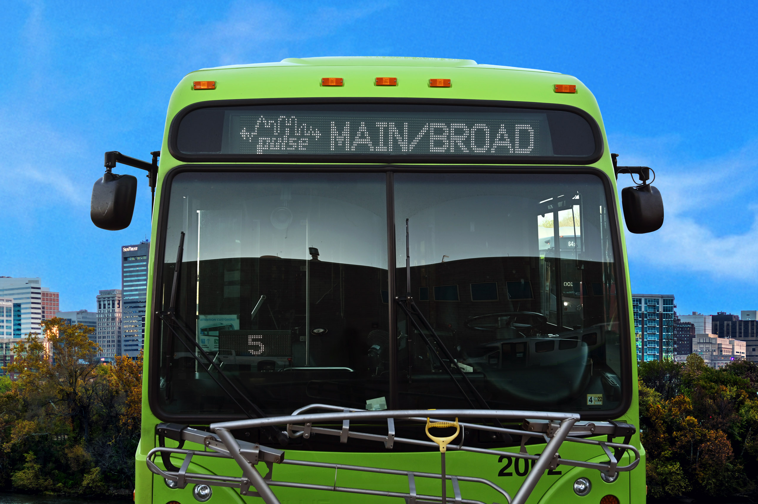 Pulse Bus displaying the MAIN/BROAD destination header, the background is the Richmond, VA skyline