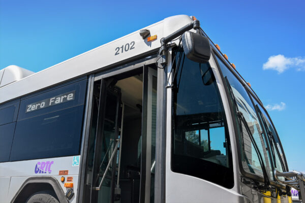 Bus with open door and sign that says Zero Fare
