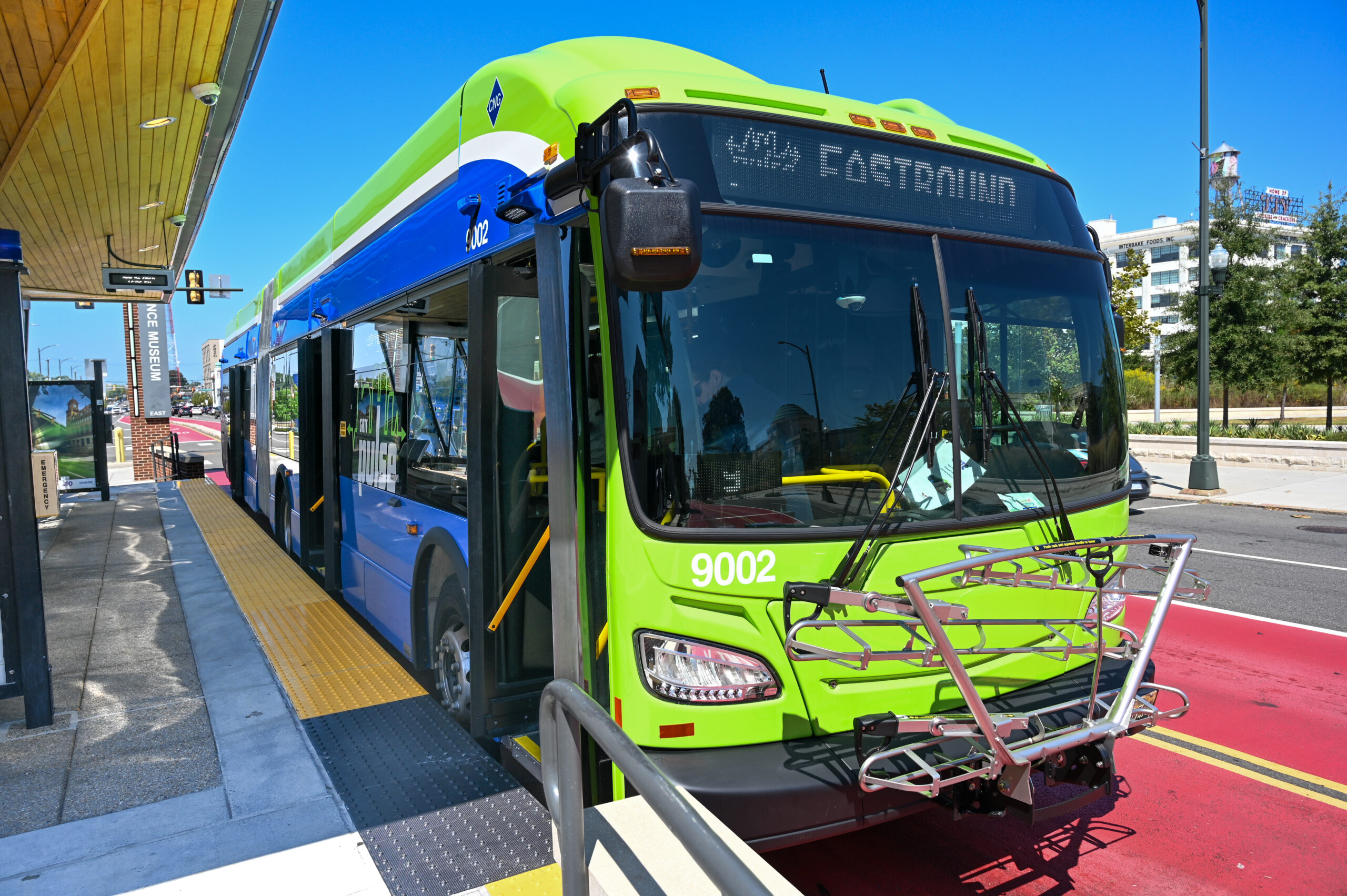60-foot articulated bus pulled up to the GRTC Pulse Scinece Museum Station for boarding